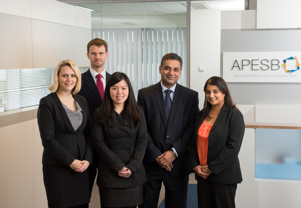 The original unretouched portrait from 2013 where 1 staff member had left and one was away.