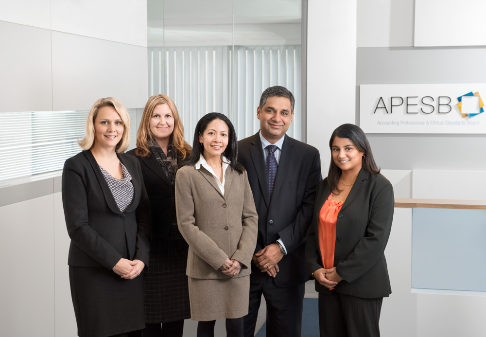 The final retouched image with the current staff.