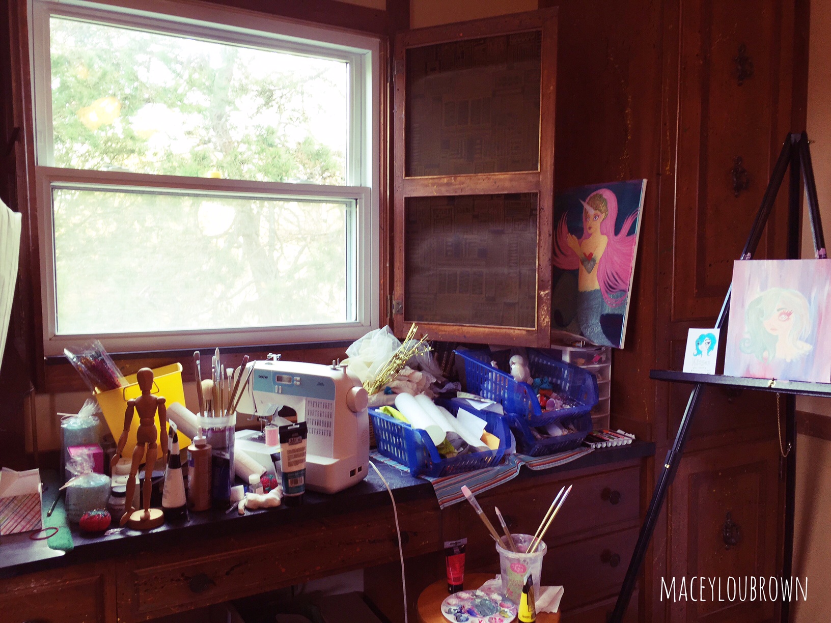 One of my windows is right above my work shelf, where I keep all my sewing and painting supplies.