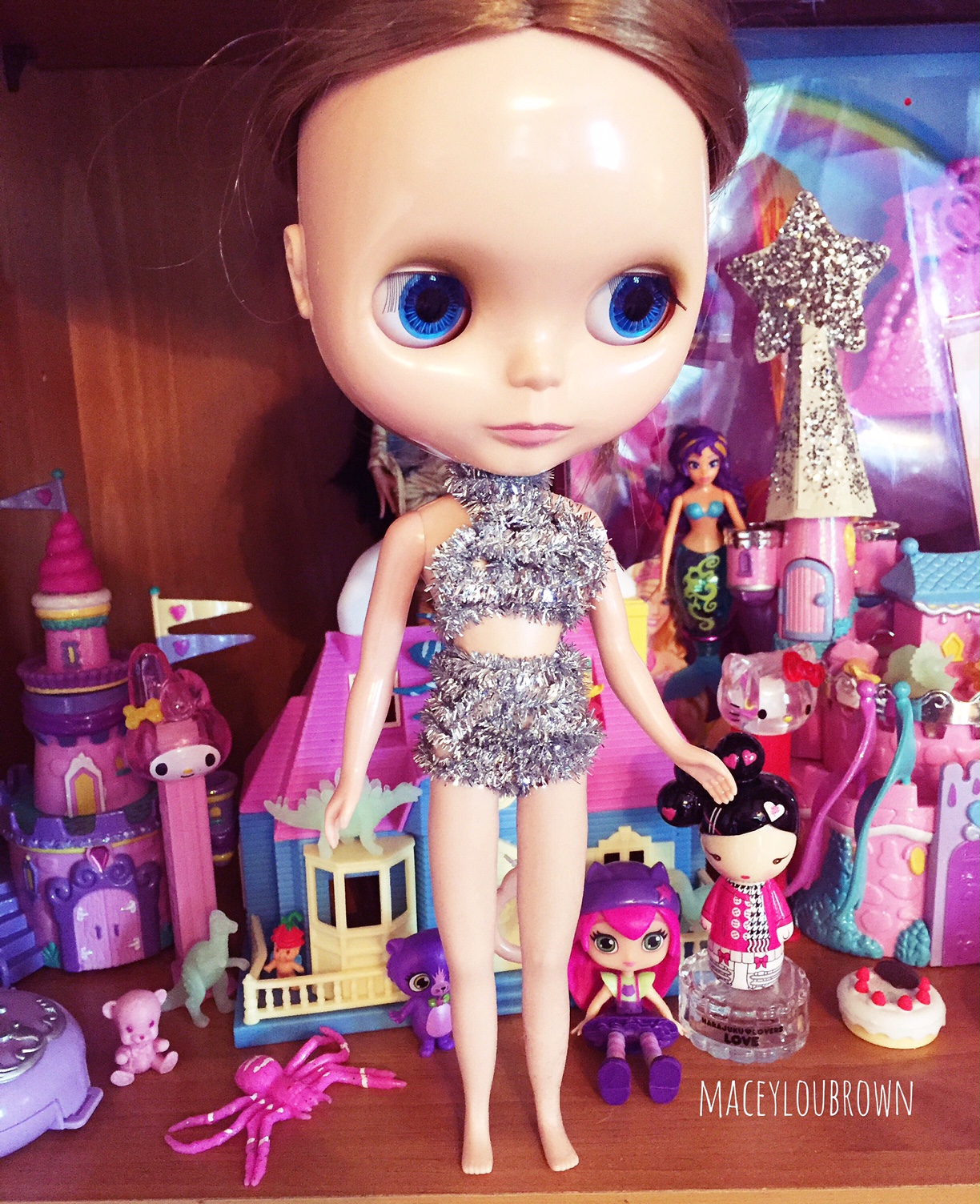 This morning, I woke up early and made her a swimsuit from some pipe cleaners. Haha, I needed something weird and carefree to do. I've been so methodical lately...I needed some child-like fun. Something easy that I don't have to take too seriously.