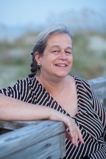Julie at beach for book.rgb_hi.jpeg