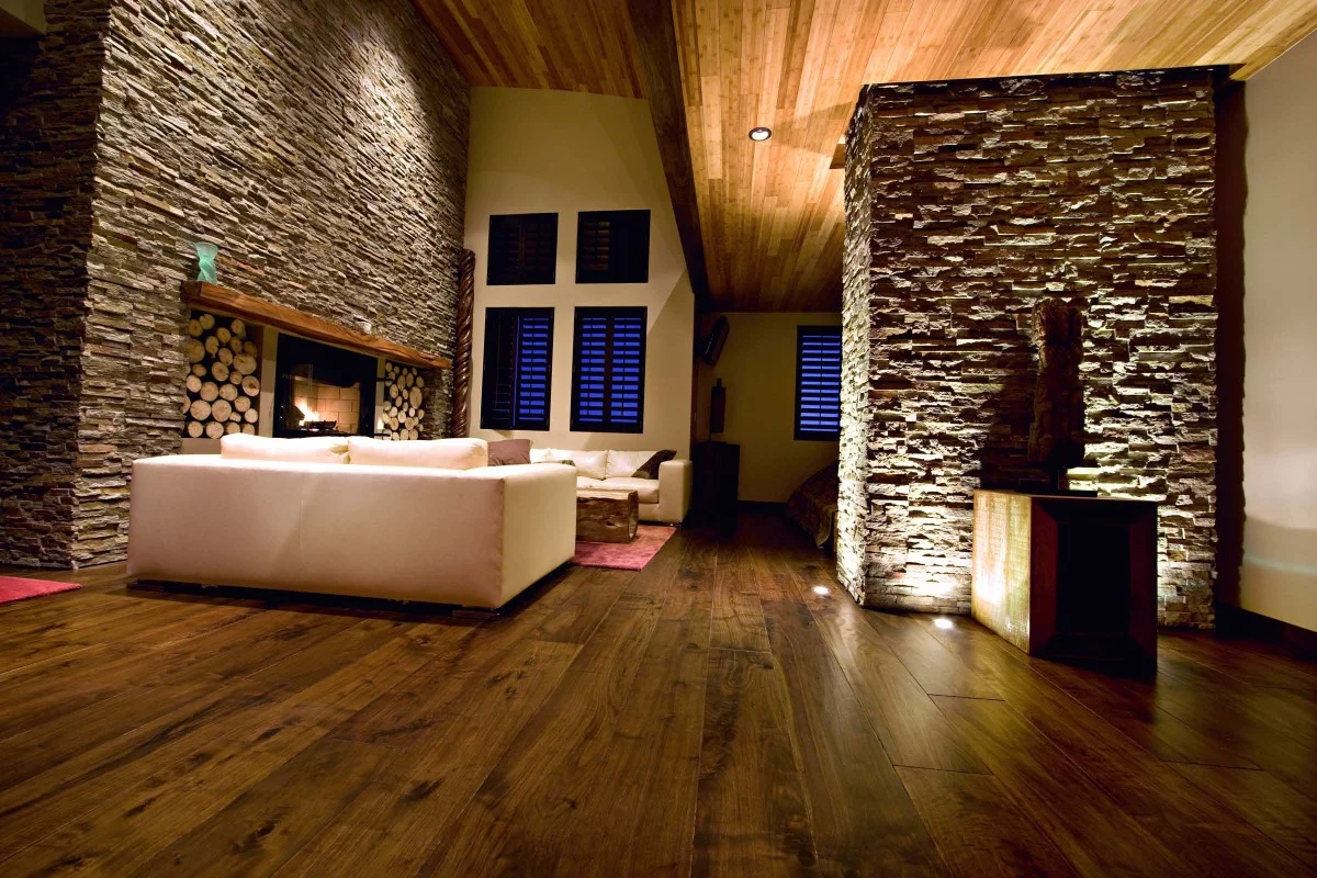 Gorgeous-Dark-Hardwood-Floor-for-Living-Room-with-White-Sofa-and-Traditional-Fireplace-Design-Also-Completed-with-Stone-Wall-and-Wall-Lighting-Decoration-Ideas.jpg
