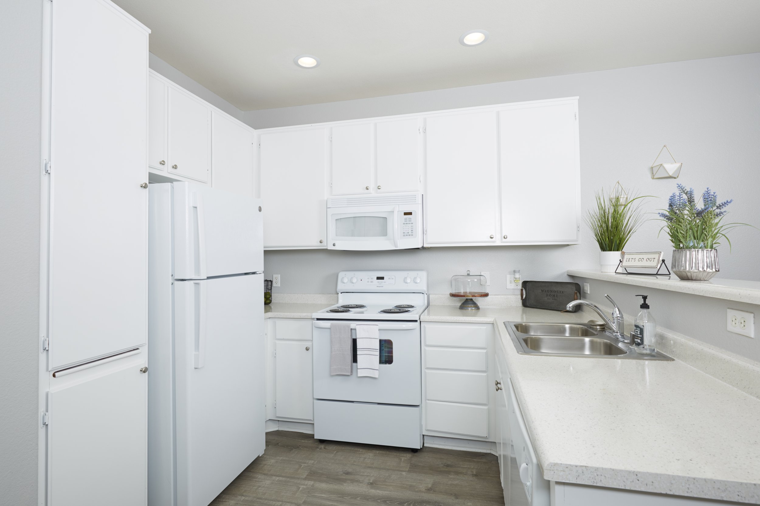  Homey kitchen with a lot of cabinet and counter space 