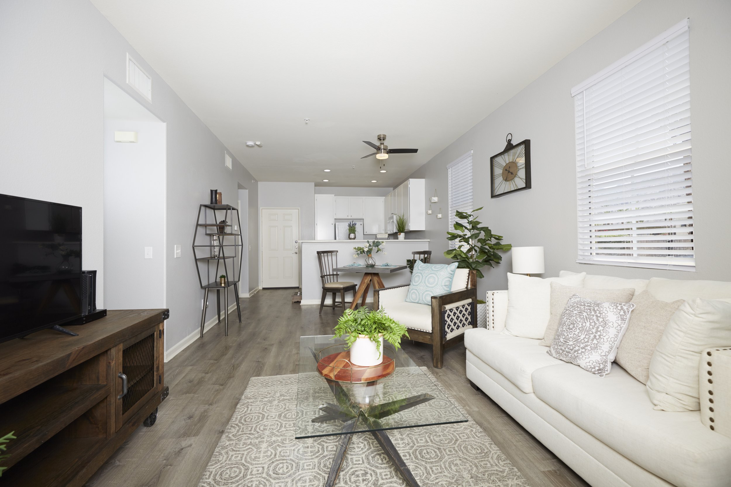  a secondary shot of the living room area with a view of the open dining area 