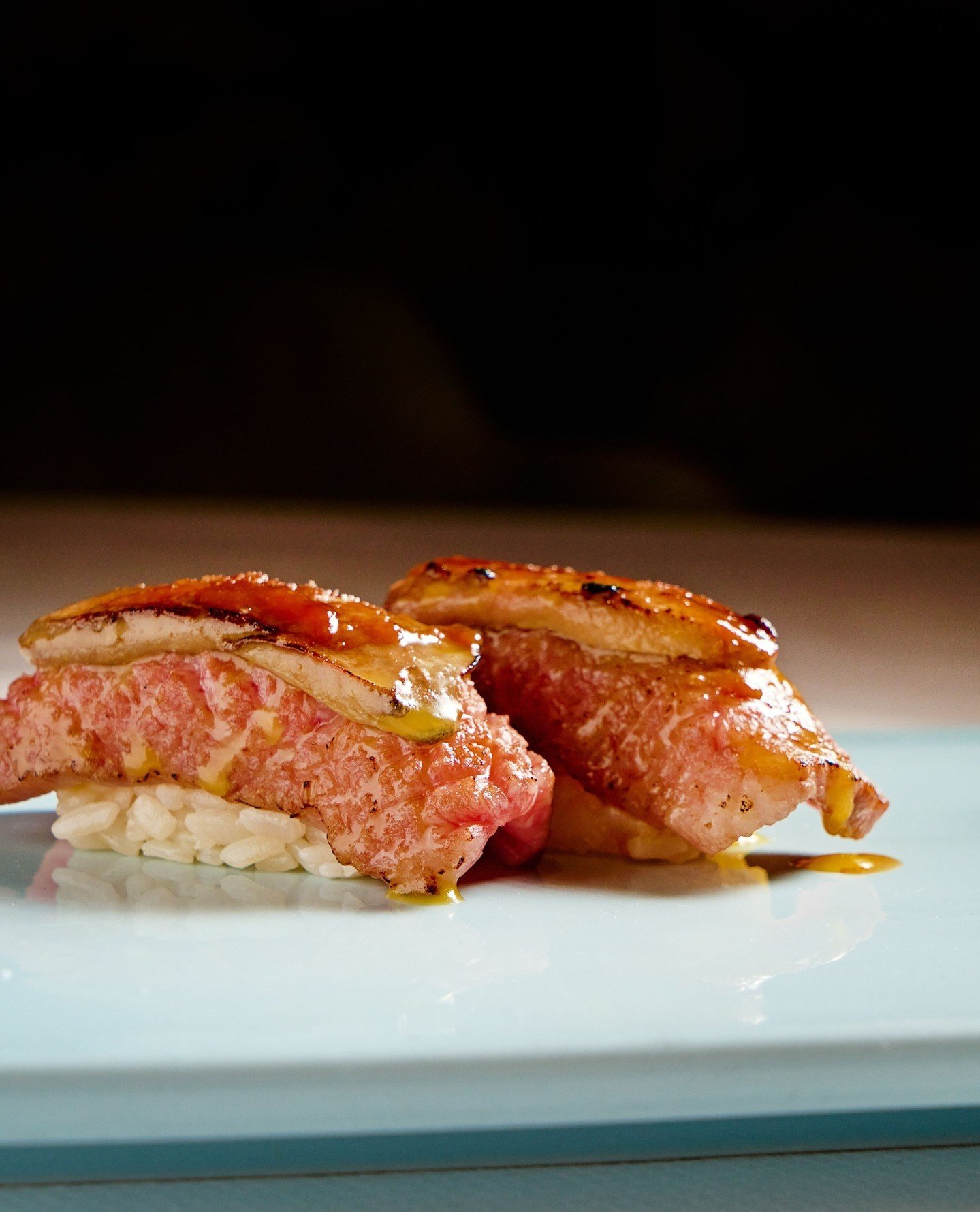 Foie for all.⁠
⁠
Wagyu &amp; Foie Gras Nigiri: Miyazaki A5 Wagyu topped with Foie Torchon, glazed with sweet and savory miso, and torched to order.⁠
⁠
Wonton Soup: chicken-foie dumplings bathed in a luscious chicken broth accented with soy and Shaoxi