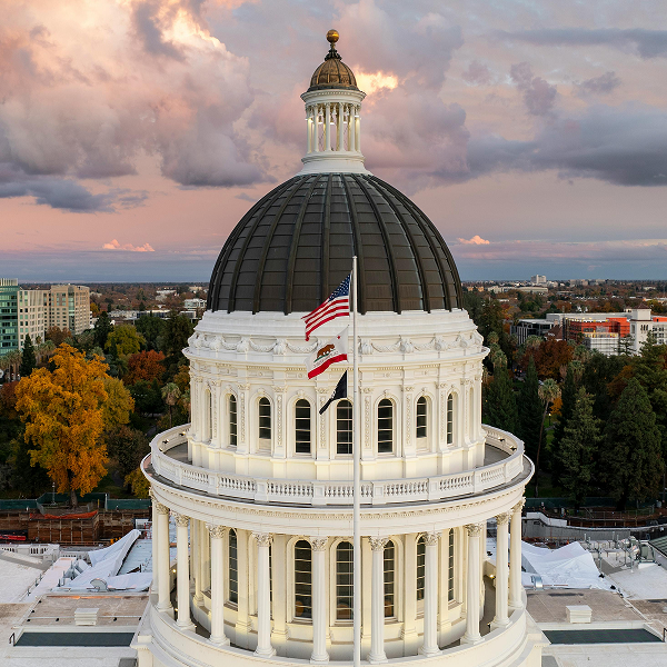 Aerial view of California State Capitol at sunset in Sacramento