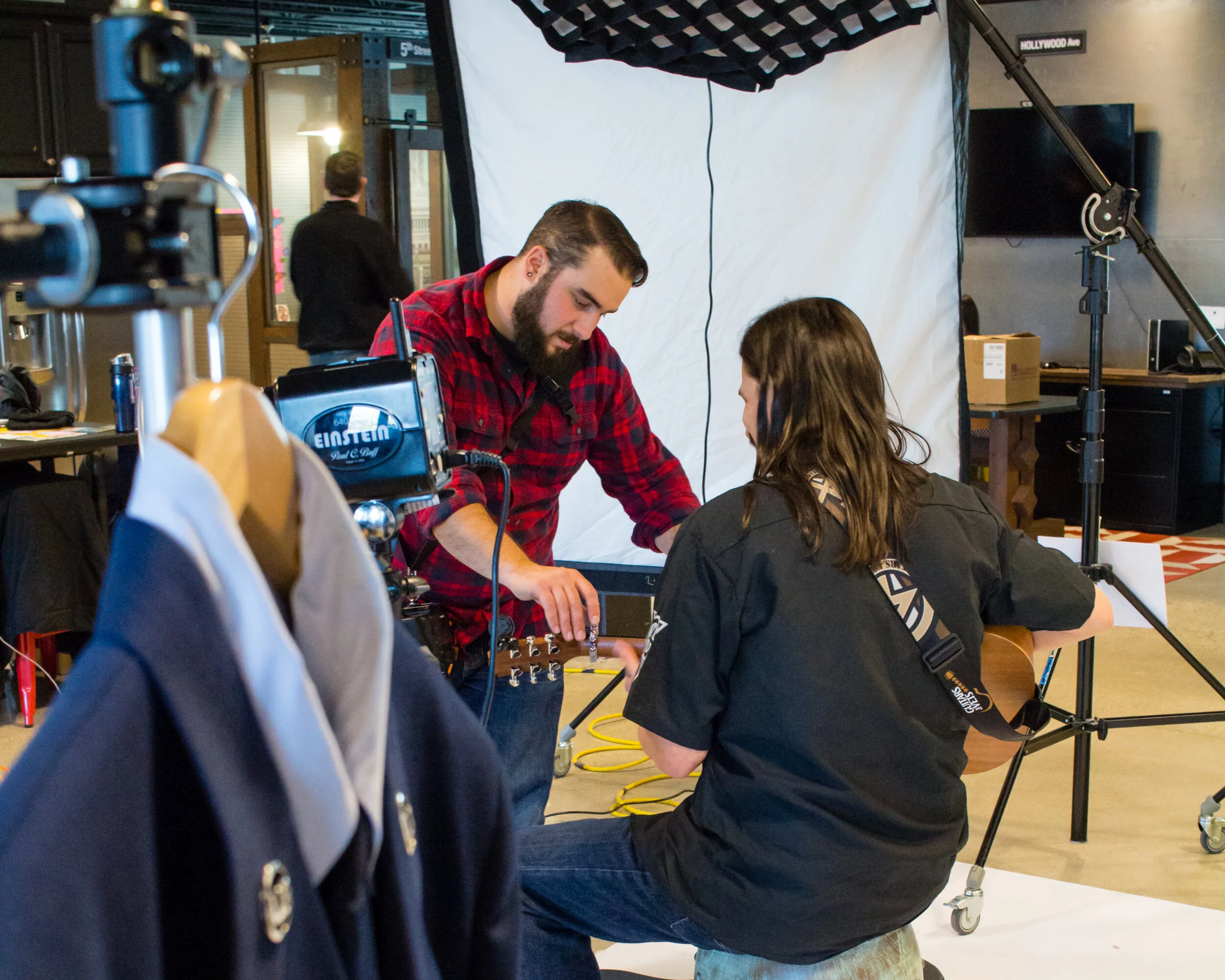 Behinds the scenes from a shoot with Guitars 4 Vets and Levy’s Leather.
