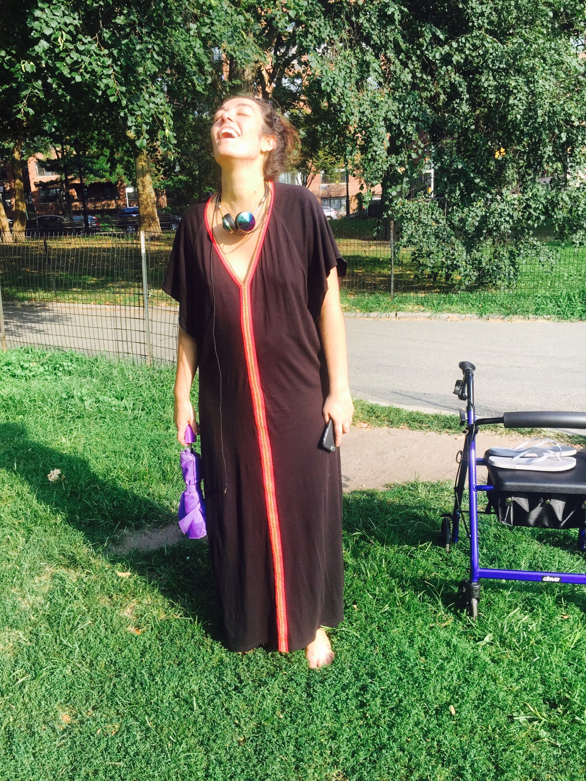 Genuine elation at stepping on grass for the first time after hospital, which was one of my goals. Photos and goals thanks to the incomparable Karina Geiger. Beautiful abaya covering my massively stretched body thanks to Pitusa . Check the umbrella I'm holding, doubles as parasol.