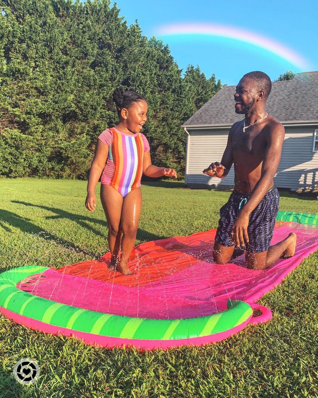 Preschool graduation done 👩🏾&zwj;🎓✔️, and we&rsquo;re ready for summer! 🌈☀️🍉

This watermelon backyard water slide was everything last summer and we&rsquo;re for sure breaking it out again. Easy to use, easy to store. 

Follow @KimBarfieldStyle 