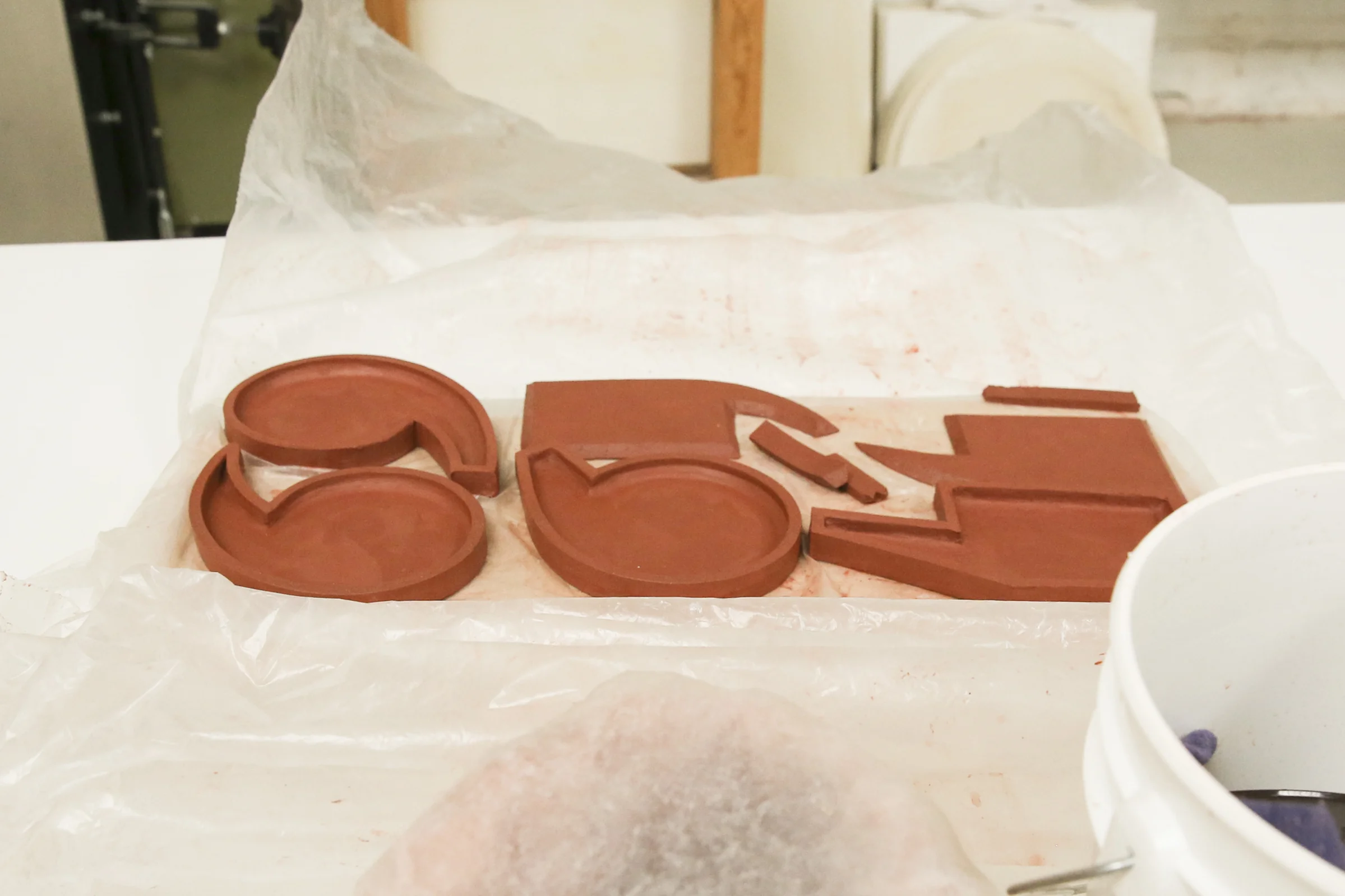  The quotation and comma plates at the next stage, with edges applied to each plate.  