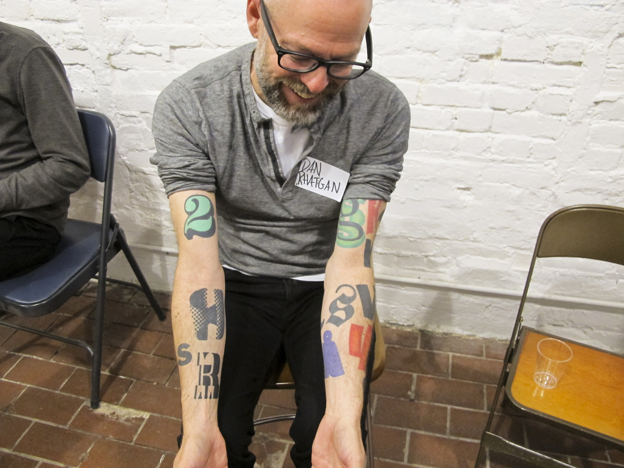 Dan shows off his typography and font based tattoos. Getting these works tattooed is an ongoing project for him and feature a multitude of sources including his own work and designs of others. May, 2016