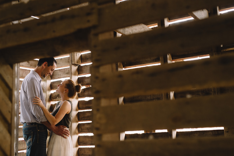 Erin and Scott through a doorway in the corn crib