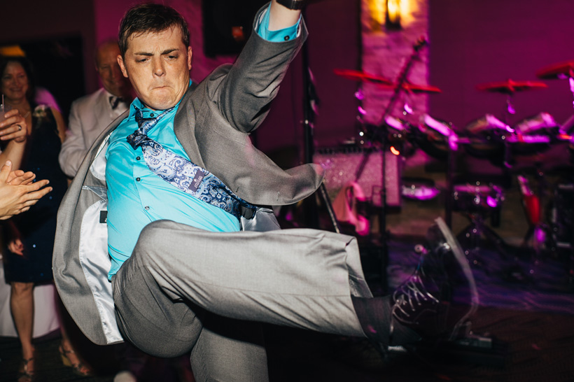 The bride's cousin does a Michael Jackson kick while performing Thriller