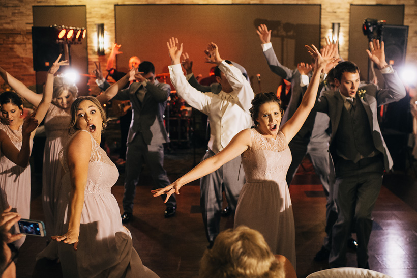 The wedding party performs a choreographed dance to Uptown Funk