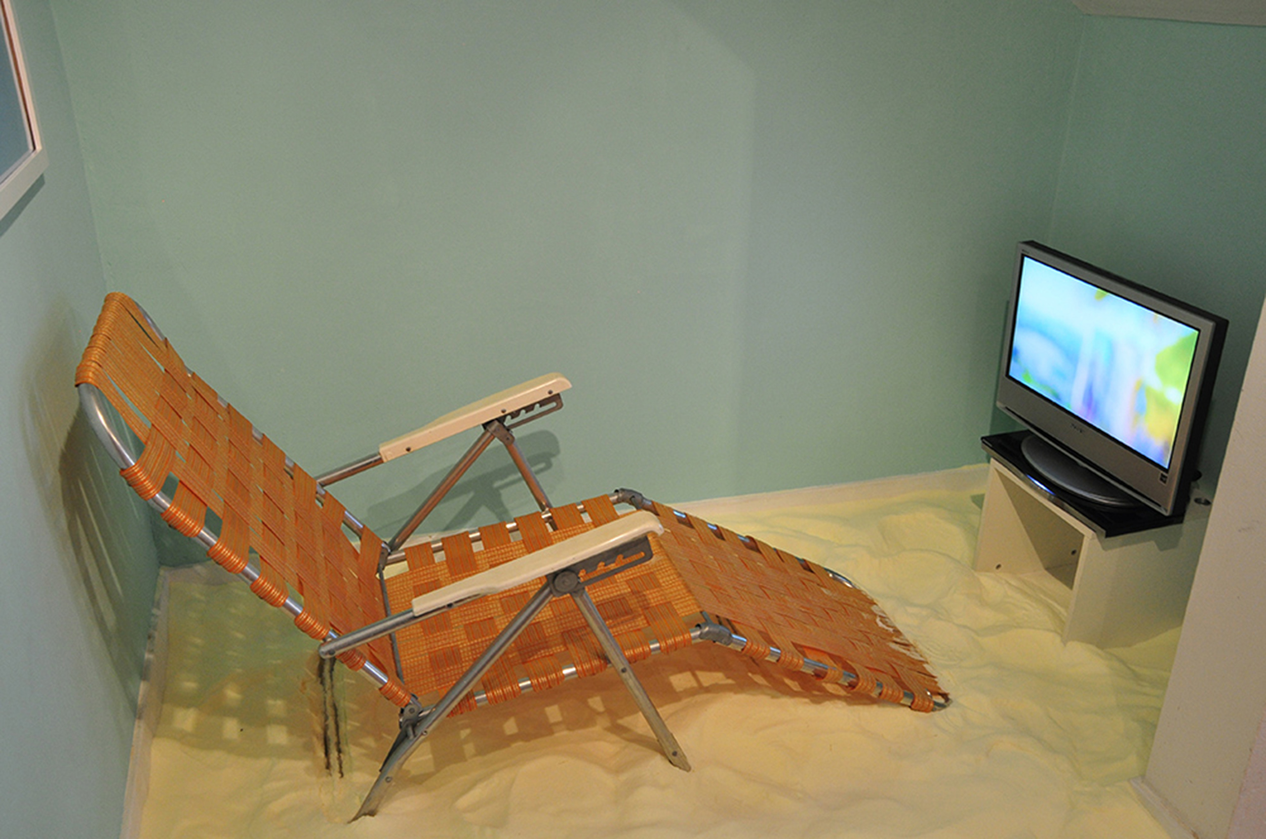 Pretty Boy (exhibition view at Comment…, San Francisco, CA), 2015, Video, salt, and lawn chair, Dimensions variable