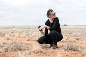2 A coming forth on Kaurna land: NICI CUMPSTON Yhonnie Scarce on Tjarutja country at Taranaki bomb site Maralinga, South Australia; image courtesy the artist and the Art Gallery of South Australia, Adelaide ; photo: Janelle Low, 2015