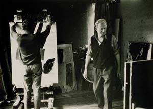 5 Drawing the mark: 50 years of Watters Gallery: GLENN BARKLEY Frank Watters and Tony Tuckson in the artist’s Wahroonga studio, choosing works for Tuckson’s first solo exhibition at Watters Gallery, Sydney, 1970; image and photo courtesy Margaret Tuckson