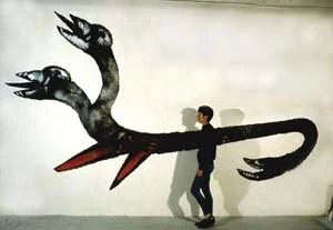 4 Translating emotion: Annette Messager in Australia: CAROLINE HANCOCK Annette Messager in front of Chimères/Chimaeras , 1982–84; image courtesy the artist and Marian Goodman Gallery, Paris and New York; © Annette Messager