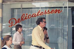 4 A meme on the Murray: Clive Murray-White Kevin Mortensen, Delicatessen , 1975, installation view, 6th Mildura Sculpture Triennial, 1975; (the work comprised a shop, several objects constructed by the artist hanging by hooks on railing, and an actor); photo: Ken Scarlett