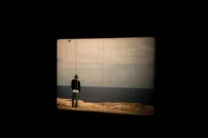 2 Todd McMillan: Ten Years of Tears: CARRIE MILLER Todd McMillan, By the Sea , 2004, cinematographer: Andrew Liversidge; 16mm film, 1min:12sec, looped, installation view Ten Years of Tears , MONA, 2013; image courtesy the artist and MONA Museum of Old and New Art, Hobart; photo: MONA/Rémi Chauvin