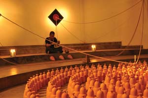 9 Equator’s Heat: Biennale Jogja XI 2011: RIFKY EFFENDY Albert Yonathan's performance with his work Cosmic Labyrinth, The Bells at the opening ceremony of Jogja Biennale XI; photo: Herkristi Kusumaningtyas