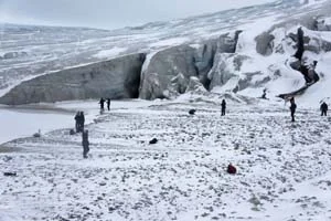 15 4000-year-old bubbles popping: Postcards from The Arctic Circle artist residency: URSZULA DAWKINS The Arctic Circle 2010, participants at work, Erikbreen glacier, Liefdefjorden, Svalbard. Image courtesy Laurie Palmer