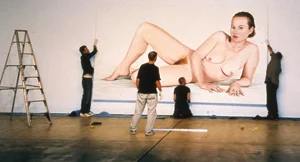1 Whose Art Counts?, MELISSA MILES In the act of installing Annette Bezor’s Blush , 2002, oil on linen, 270 x 480cm, at the Institute of Modern Art, Brisbane. Image courtesy the artist.