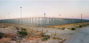 9 Monument to Memory: Woomera in Australian contemporary art: VERONICA TELLO Rosemary Laing, Welcome to Australia, 2004, Type C photograph. Courtesy of Rosemary Laing and Tolarno Galleries, Melbourne