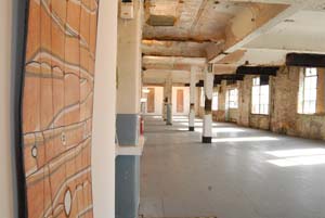 6 Rarrk – London: JEREMY ECCLES Ground view of the Level 3 room at the Bargehouse Gallery with barks by John Mawurndjul (front left) and Timothy Wulanjbirr. Courtesy Maningrida Arts and Culture and Josh Lilley Fine Art. Photograph by Sam Green