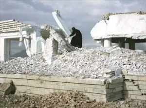 5 Hope in white ruins: NIKOS PAPASTERGIADIS Video still from Lida Abdul, White house , 2005, 16mm film transferred to video. Courtesy of the artist.