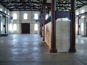 8 Artists as model workers: ROSS WOODROW Mike Parr, Sitting member , performance on 3 October 2005 (8 hours), Boiler Shop, Honeysuckle Workshops, Newcastle (documentation of performance). Courtesy of the artist. Photo Ross Woodrow
