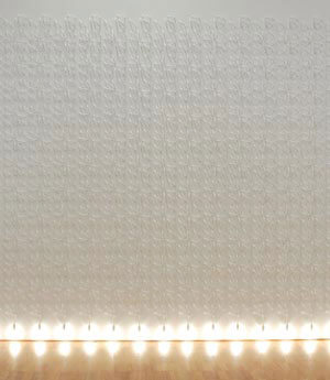 3 Xstrata Coal Emerging Indigenous Art Award 2006: JEREMY ECCLES Jonathon Jones, Kamilaroi,Wiradjuri people, Lumination fall wall weave , 2004/06, electrical cable, light fittings, bulbs and MDF board. Collection of the artist. Courtesy of Gallery Barry Keldoulis, Sydney