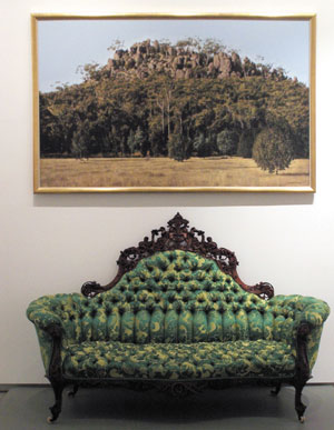 4 A philanthropic milestone: TarraWarra Museum of Art in the Yarra Valley: SARAH THOMAS, Victoria Installation detail from the exhibition Echo at TarraWarra Museum of Art, showing William Delafield Cook, Hanging Rock , 1985, synthetic polymer paint on canvas, collection of TarraWarra Art Museum (top); and unknown maker, Sofa (part of a drawing-room suite), c.1865, blackwood (Acacia melanoxion) and silk. Collection of the National Gallery of Victoria (bottom). Photo Jenna Blyth 5 Sky train: The 21st NATSIAA in Darwin: MAURICE O'RIORDAN Flora Nulyarima Napaljarri Hotl, Train , 2004, acrylic on canvas. Courtesy of the artist and Julalikari Arts. Photo Gilbert Herrada, MAGNT