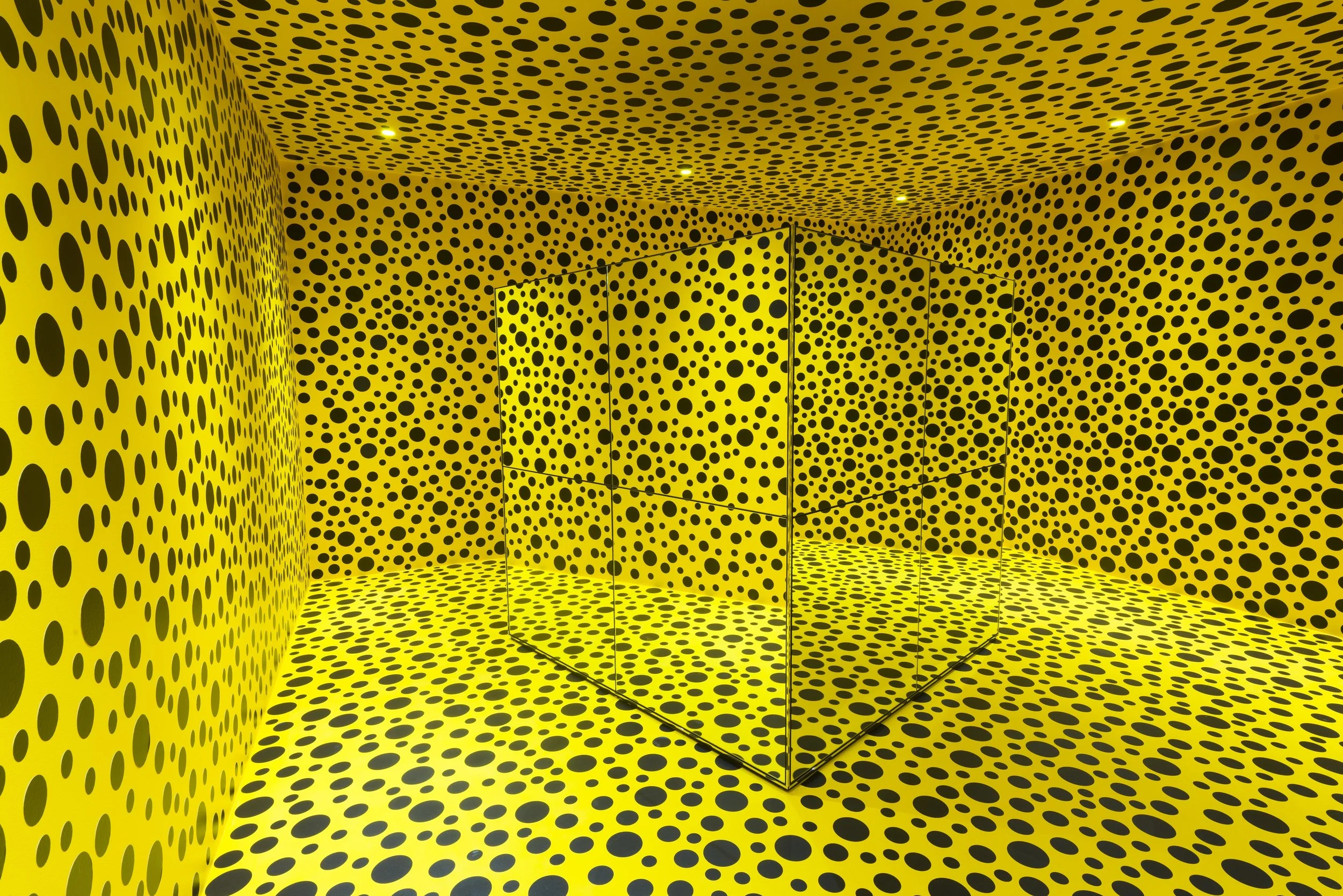 Yayoi Kusama, The Spirits of the Pumpkins Descended into the Heavens , 2017, installation view, ‘Yayoi Kusama: Life is the Heart of a Rainbow’, Queensland Art Gallery / Gallery of Modern Art (QAGOMA), Brisbane, 2017; mirror box 200 x 200 x 200cm (approx.); room 300 x 600 x 600cm (approx.); photo: Natasha Harth, QAGOMA