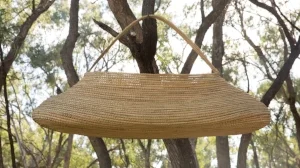 2 REVELATIONS AND REVOLUTIONS: HETTI PERKINS IN CONVERSATION WITH MAMI KATAOKA Yvonne Koolmatrie, Burial basket , 2017,woven sedge rushes, 46 x 111 x 57cm;image courtesy the artist and Aboriginal & Pacific Art, Sydney;© YvonneKoolmatrie and Aboriginal & Pacific Art, Sydney; photo: Isaac Coen Lindsay