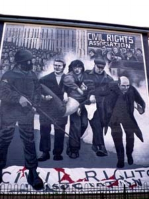7 The battle of the Bogside Artists in Derry, Northern Ireland: CHRIS HOLMES Bogside Artists, Bloody Sunday , 1997, mural, Bogside, Derry