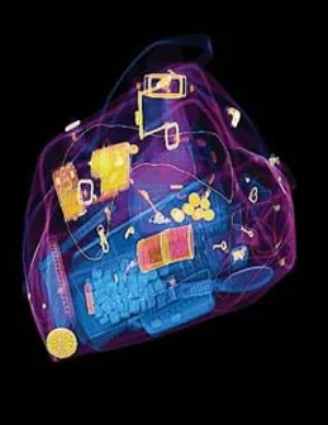 5 Power camouflage: an interview with Michael Goldberg, DAVID McNEILL Michael Goldberg, video still of luggage X-ray (from loop of 50 images), installation detail from Strong language Some violence Adult themes, 2008, Artspace, Sydney. Image courtesy the artist