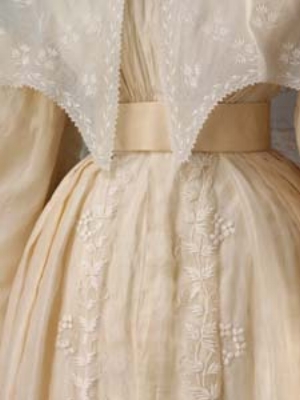 8 Somewhere between meringue and ivory: the White Wedding Dress: SUZANNE SPUNNER Silk wedding dress, over-sleeves and pelerine, trimmed with blond silk lace (detail), British, 1828. Worn by Eliza Larken for her marriage to William (later 6th Bar on) Monson. ©Victoria & Albert Museum / V&A Images
