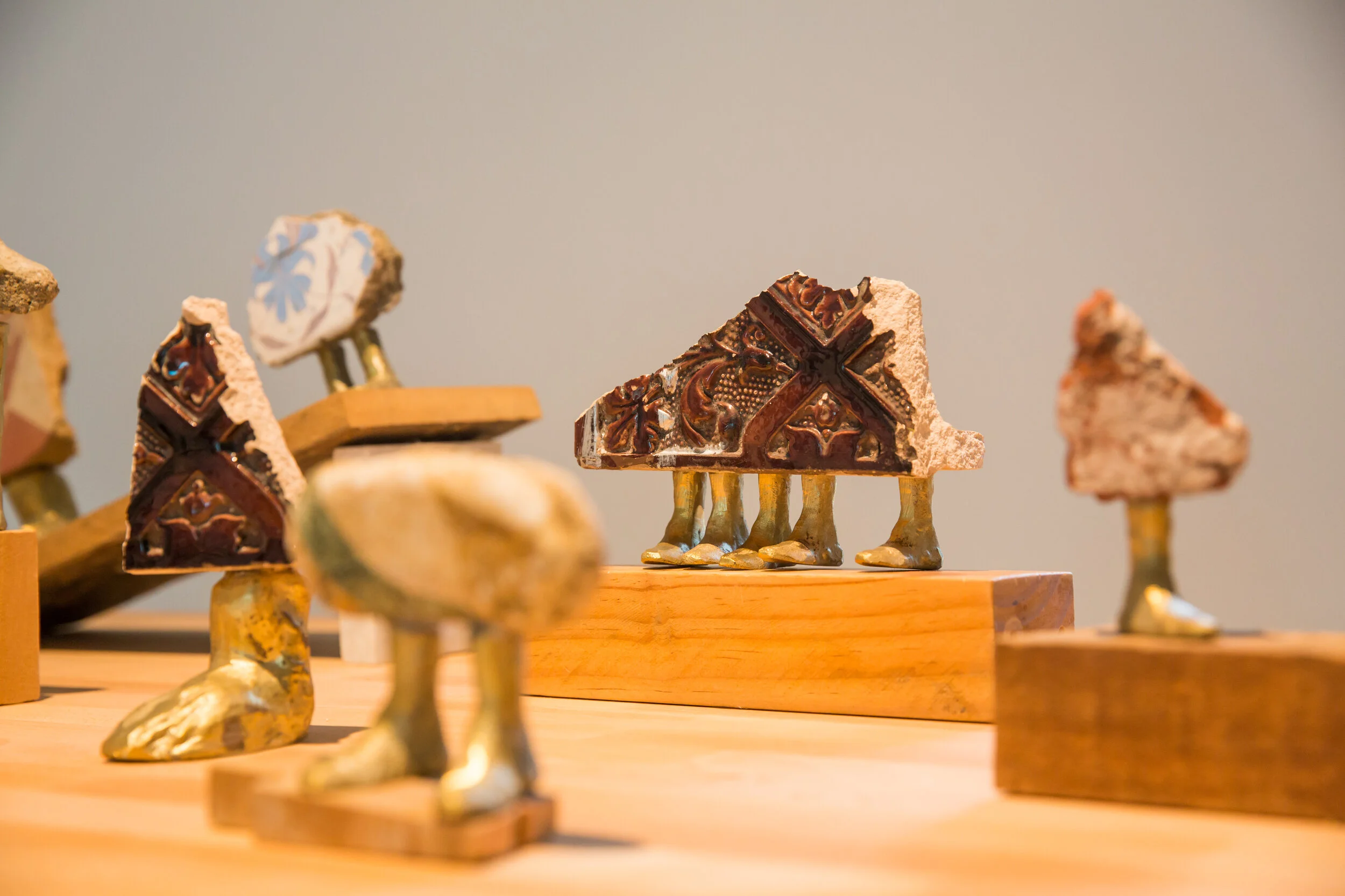 Hera Büyüktaşçıyan,  A Study on Endless Archipelagos , 2017–19, installation detail, National Gallery Singapore, 2019–20; cement, bronze and wood, dimensions variable; courtesy the artist and Green Art Gallery, Dubai; photo: Singapore Art Museum