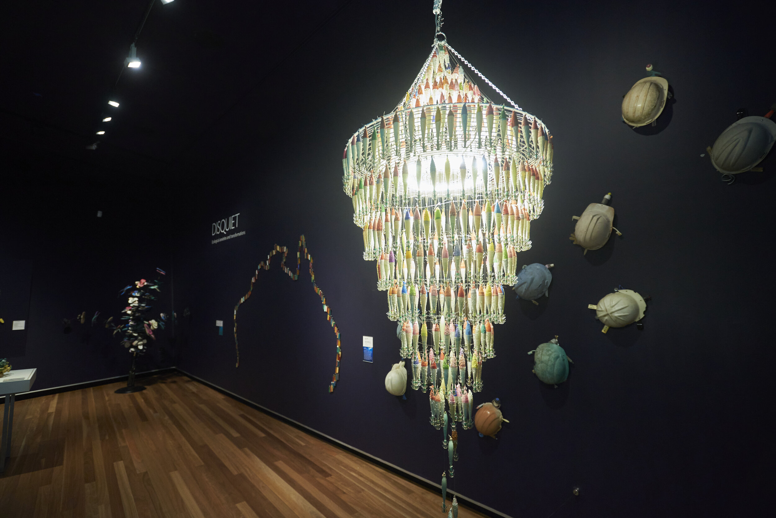  Barbara Dover,  Deep Light , 2019, installation view (foreground), ‘Disquiet: Ecological Anxieties and Transformations’, Artspace Mackay, 2020; found objects, squid hooks, 160 x 80 x 80cm; photo: Jim Cullen 