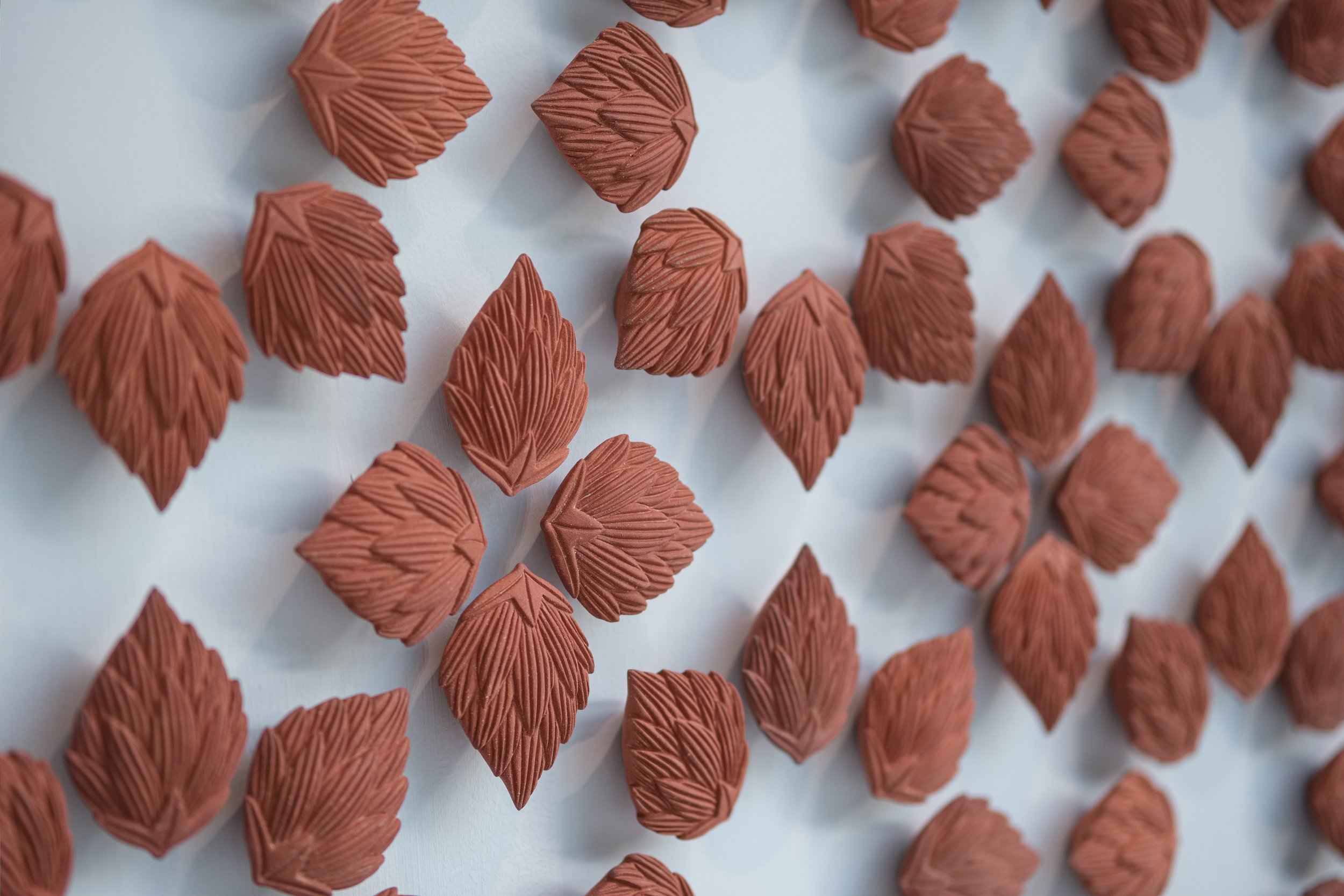  Albert Yonathan Setyawan,  Aeviternum , 2022, detail; terracotta, slip-casting, 210 x 210cm (536 pieces); courtesy Mind Set Art Centre, Taipei; photo: Zhu Chi-Hong 