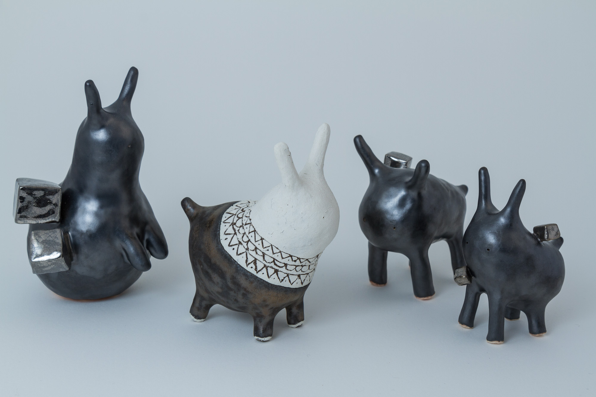 Some of the Geologist bunny primitive sculptures are still available in the web shop .