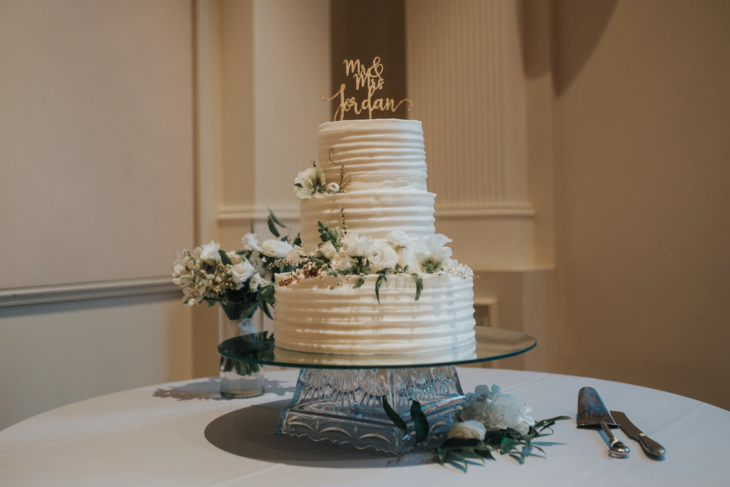Wedding cake with eucalyptus accents