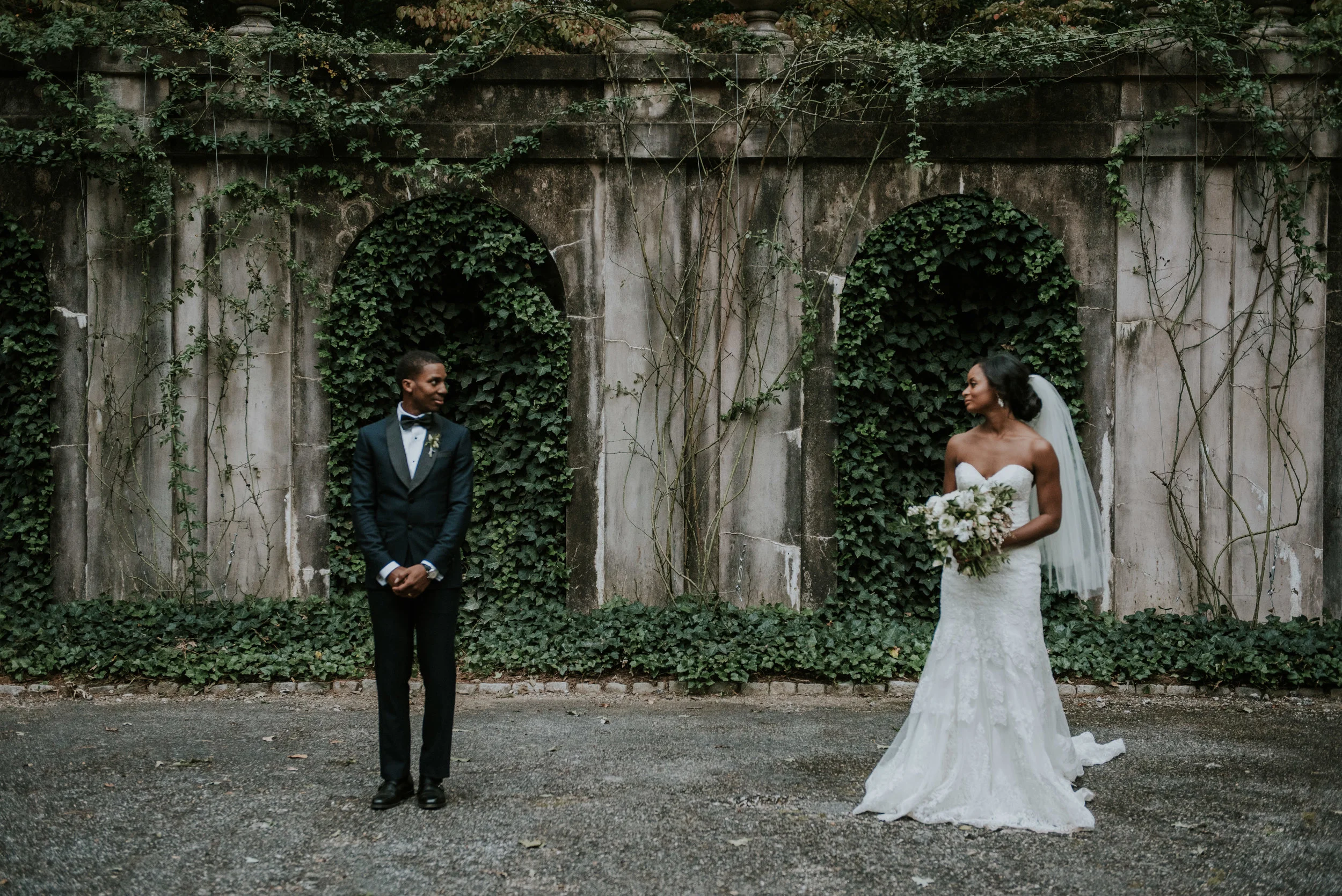 Bride and groom spaced apart at Swan House in Atlanta, GA