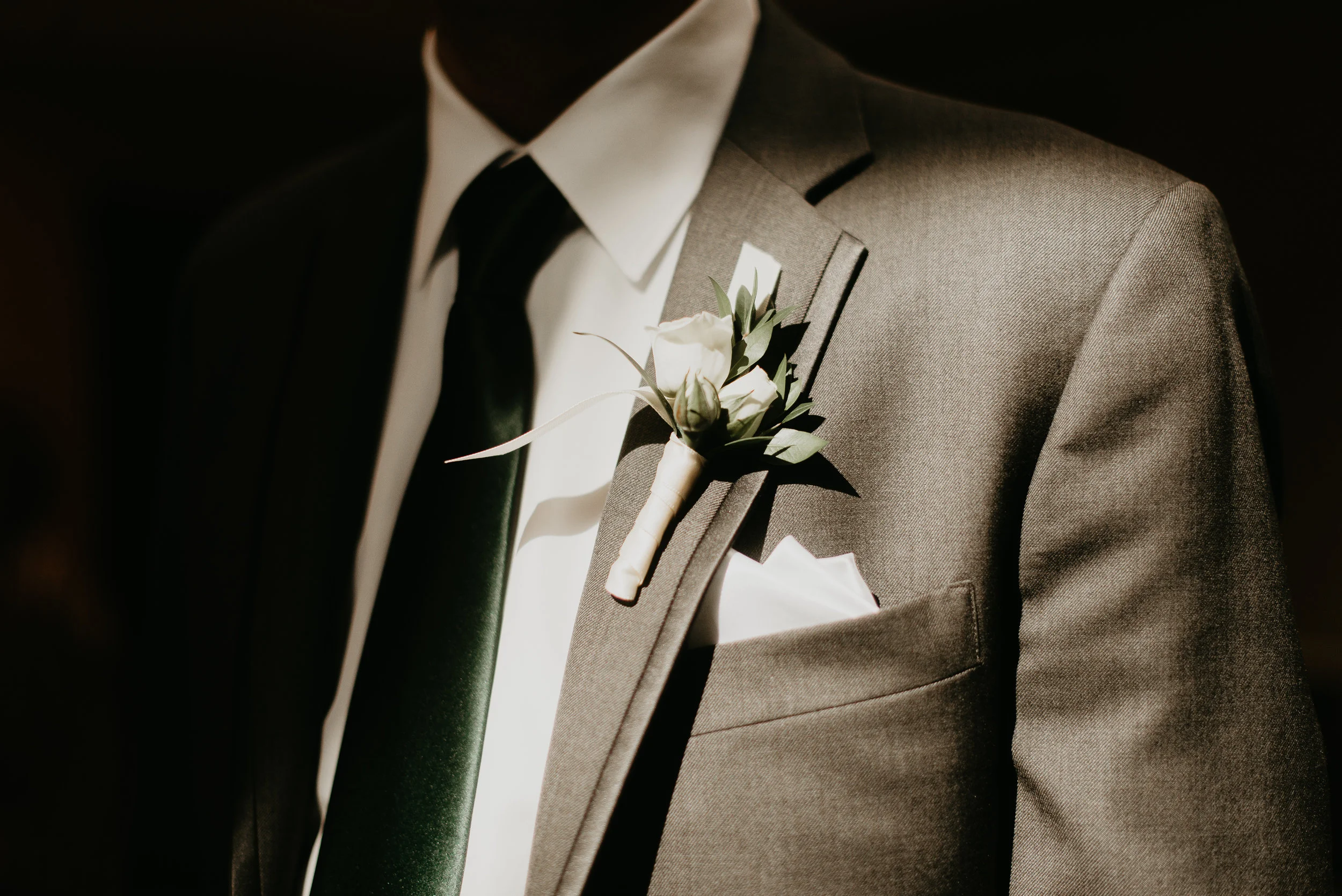 Groomsmen boutonniere with moody tones