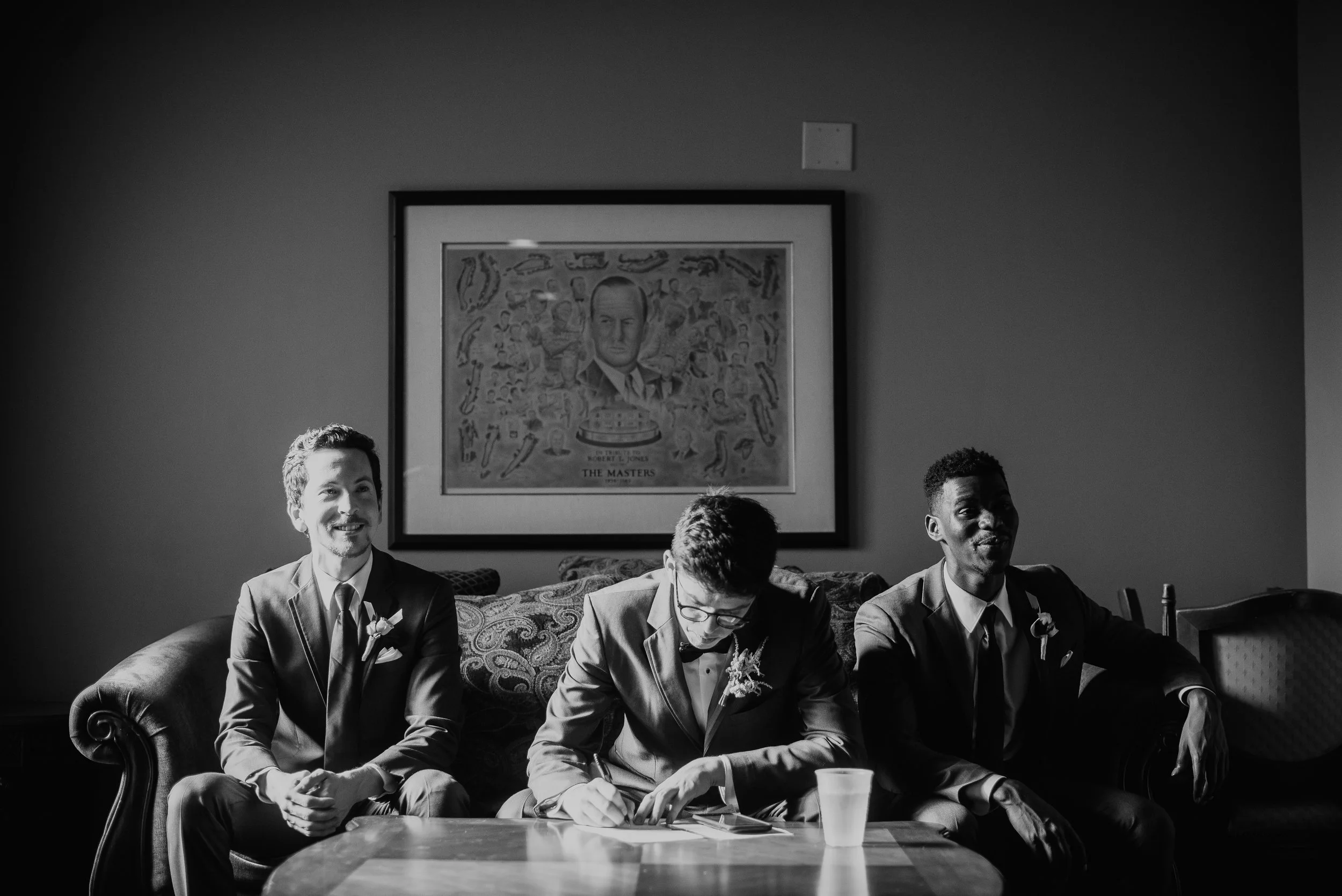 Groom writing vows