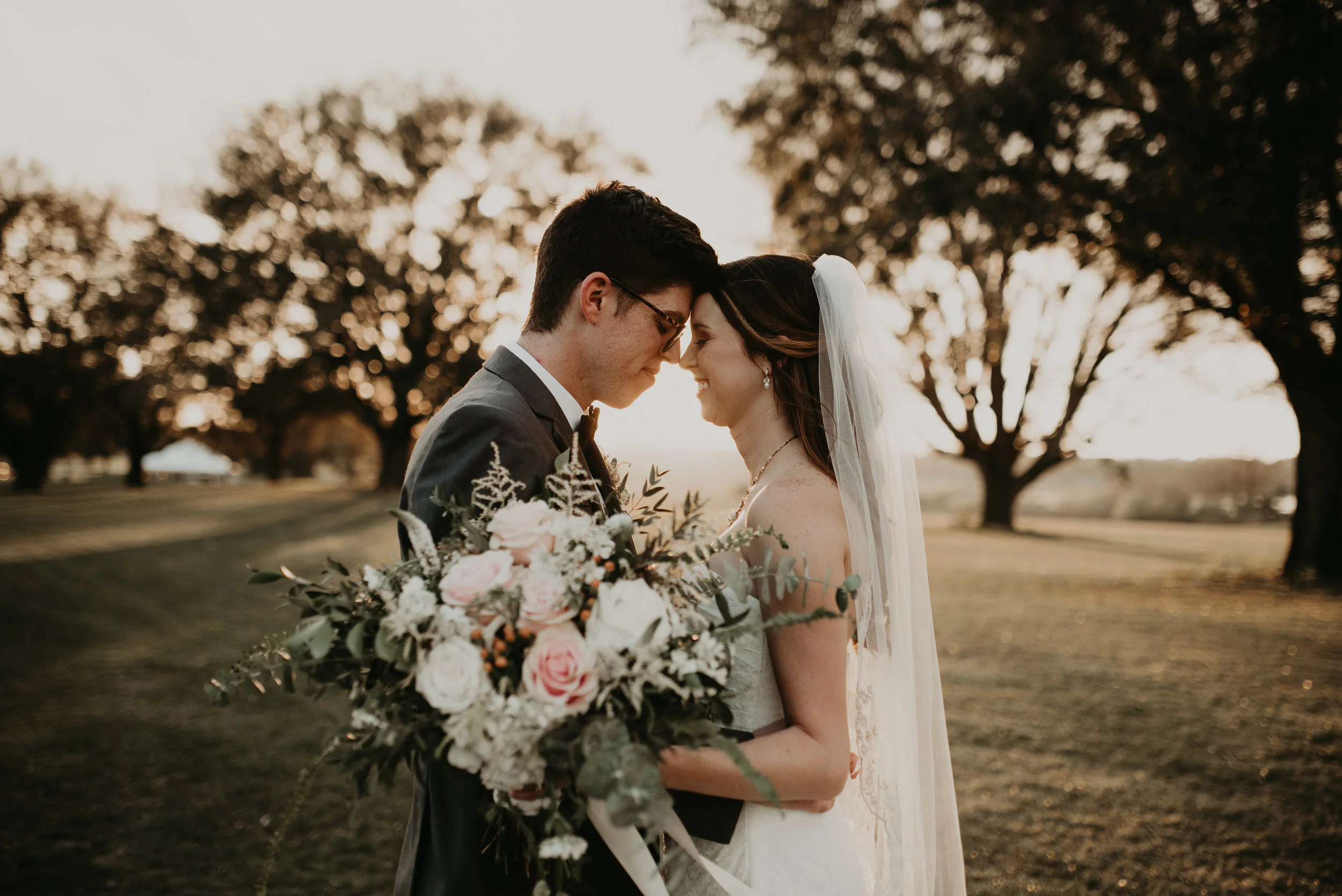 Bride and groom intimate during golden hour at MetroWest Golf Club in Orlando, FL