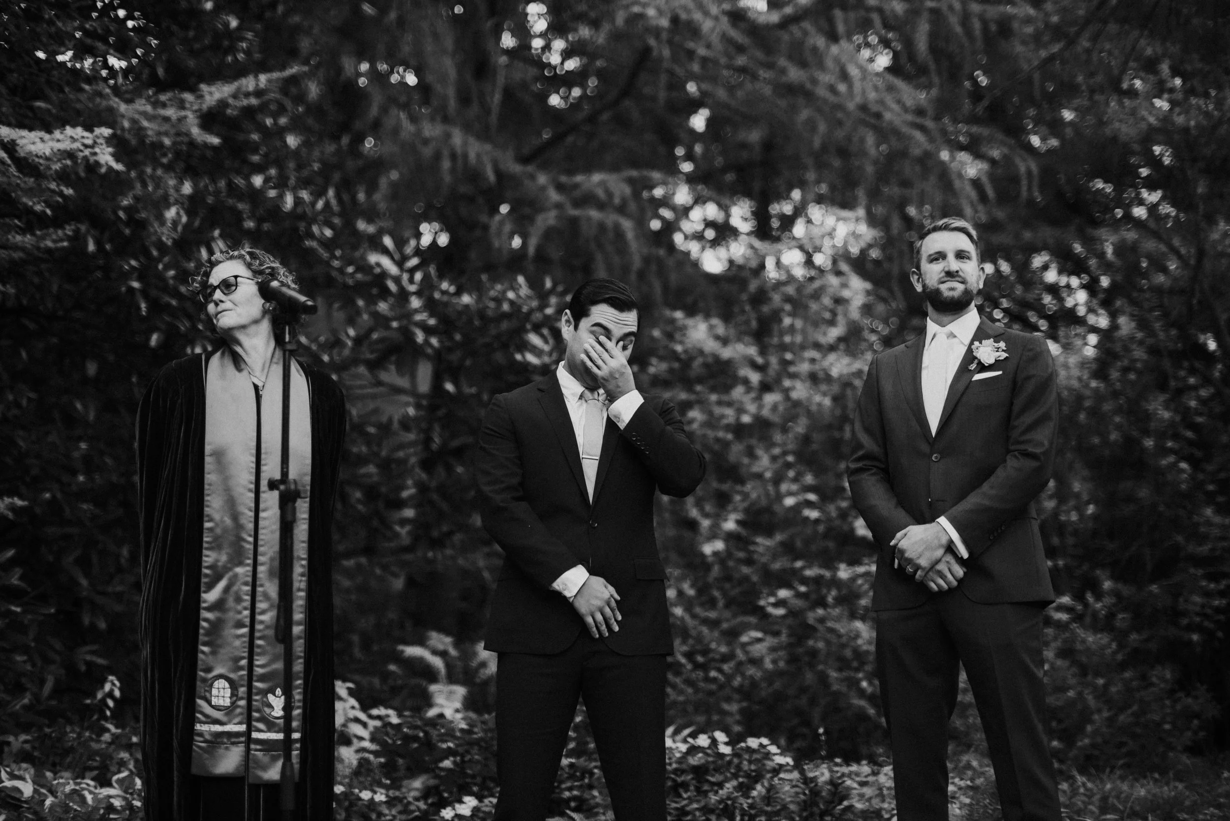 Groom crying at wedding ceremony at The Trolley Barn in Atlanta, GA