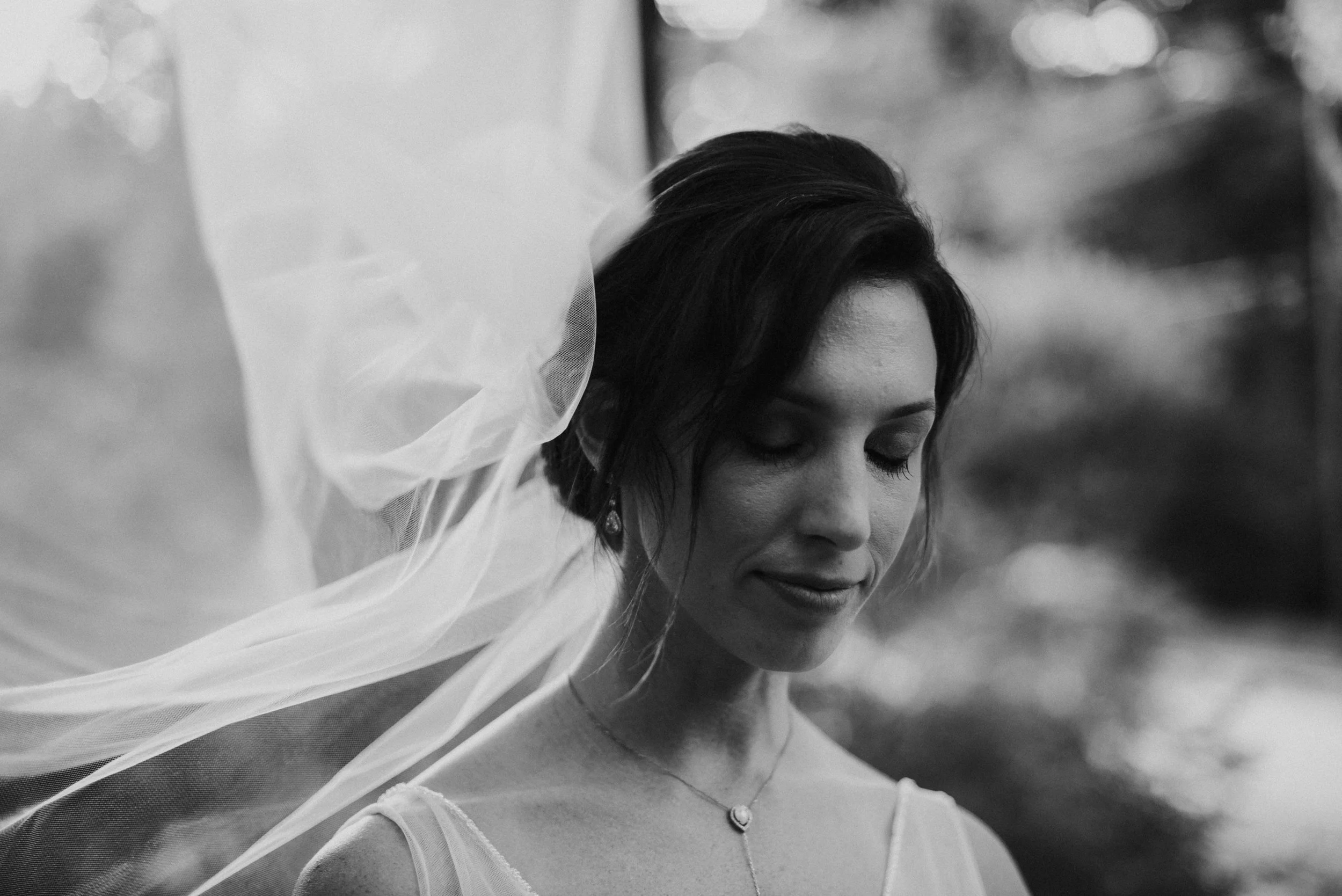 Bridal portrait with windblown veil