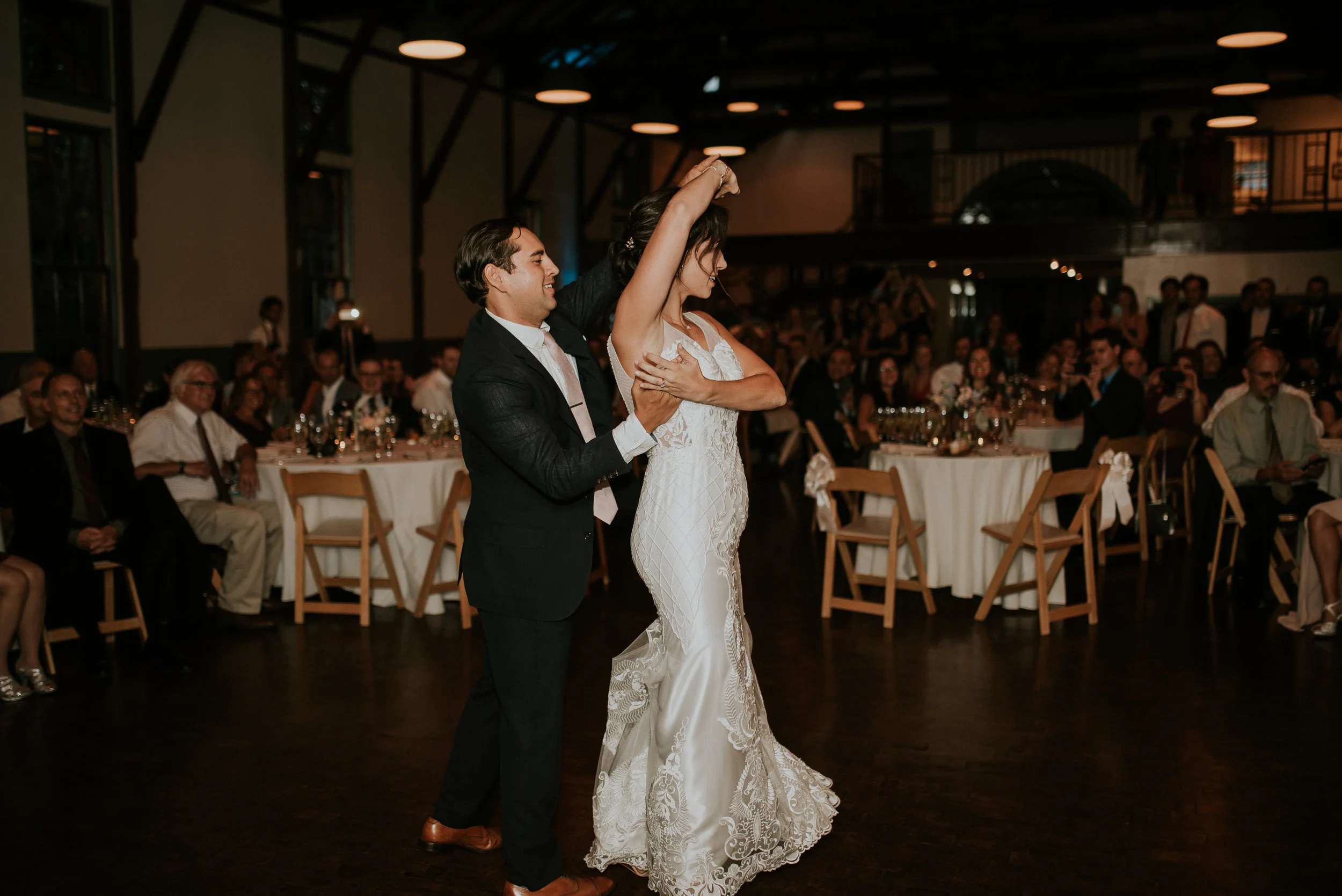 Bride and groom dancing at wedding reception
